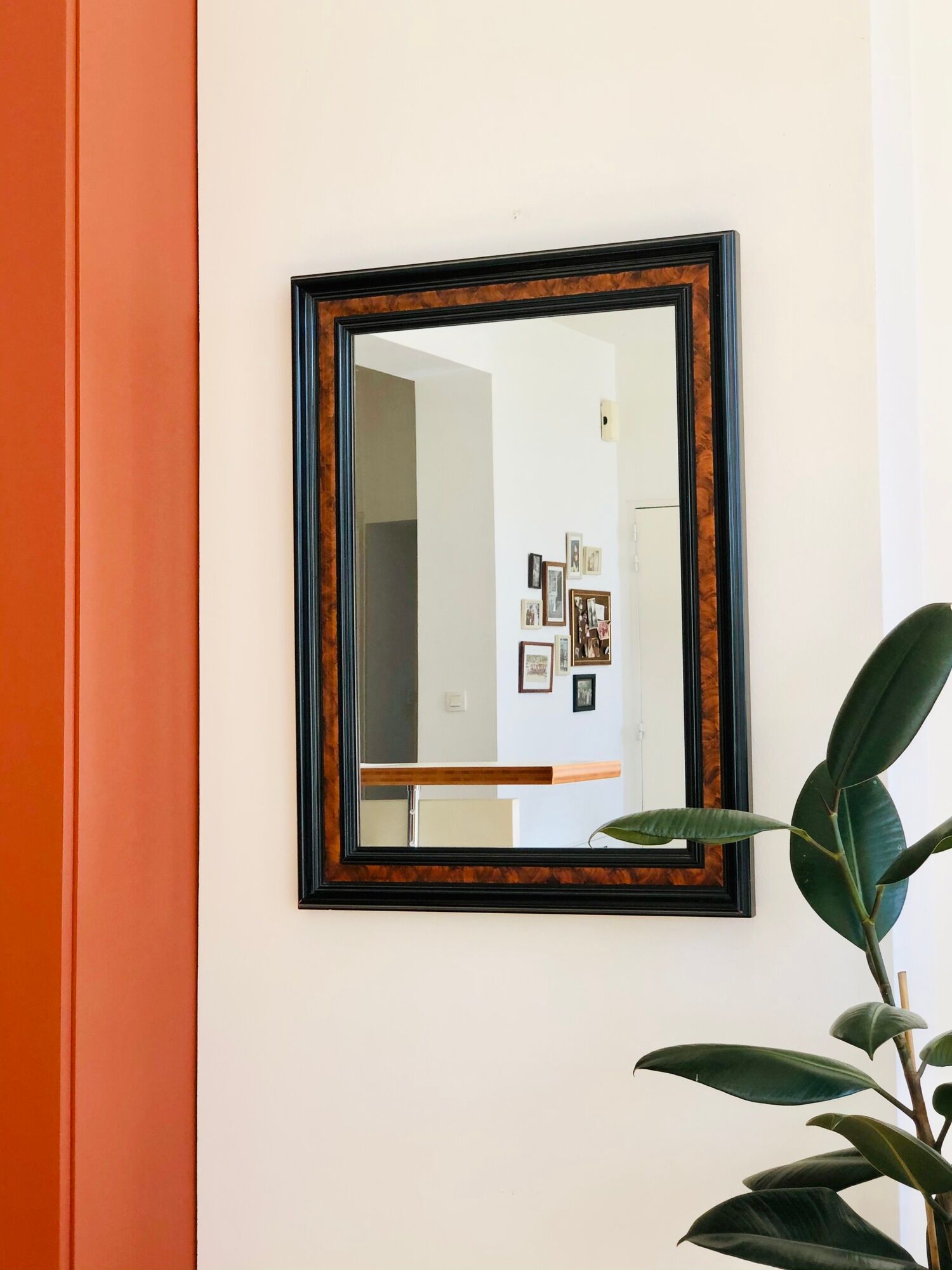 Old wall mirror 72 x 52 cm in black wood and faux mahogany