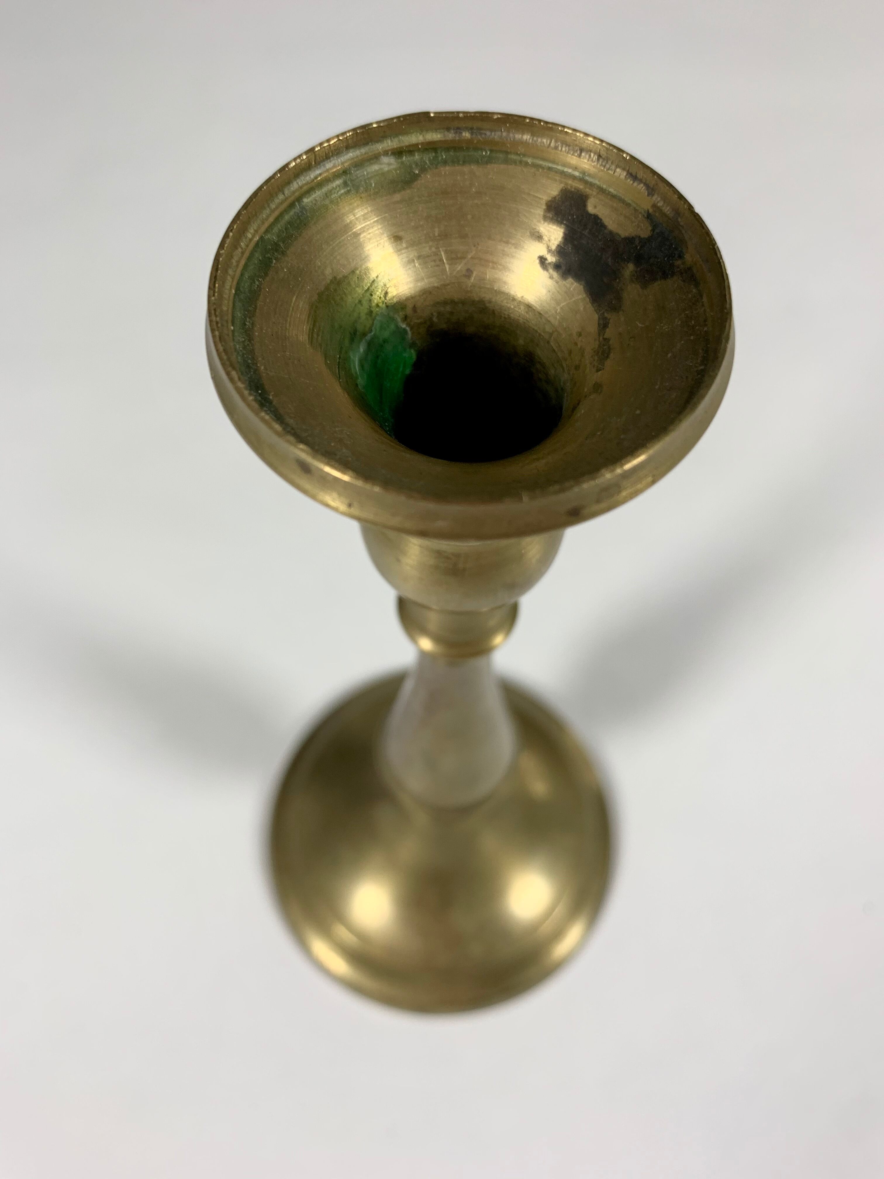 Candlestick in patinated gilded copper late nineteenth century