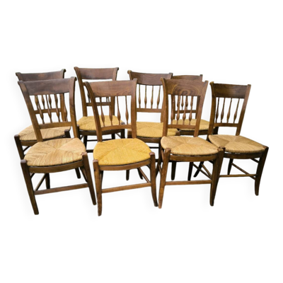 Série de 8 chaises en merisier massif paillées époque Directoire