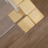 Nesting tables from the 1970s in brass, glass and lucite