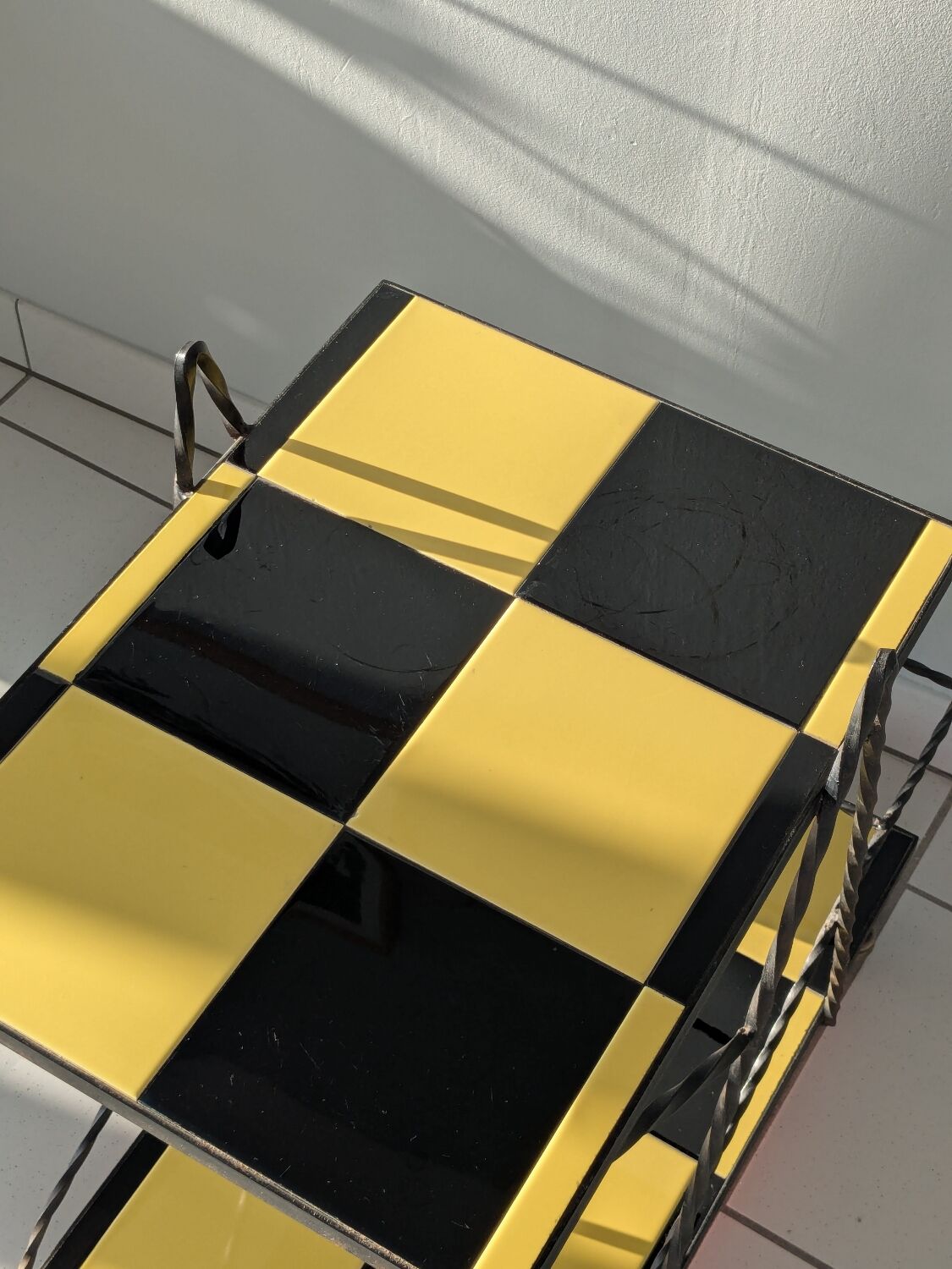 Vintage black and yellow checkered rolling bar trolley