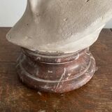 Plaster bust on marble stand