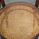 4 antique wooden and cane bistro chairs