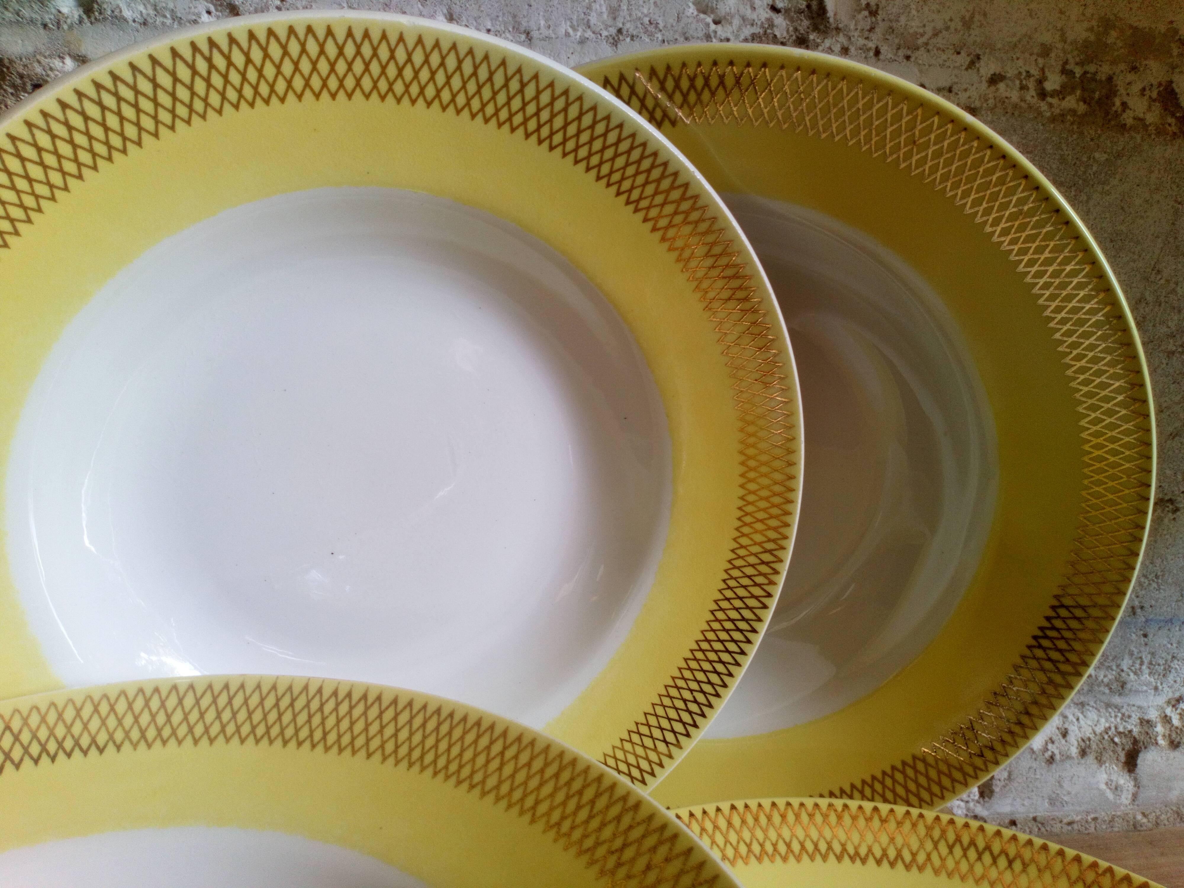Six vintage plates with yellow and gold décor