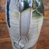Enameled stoneware pitcher signed