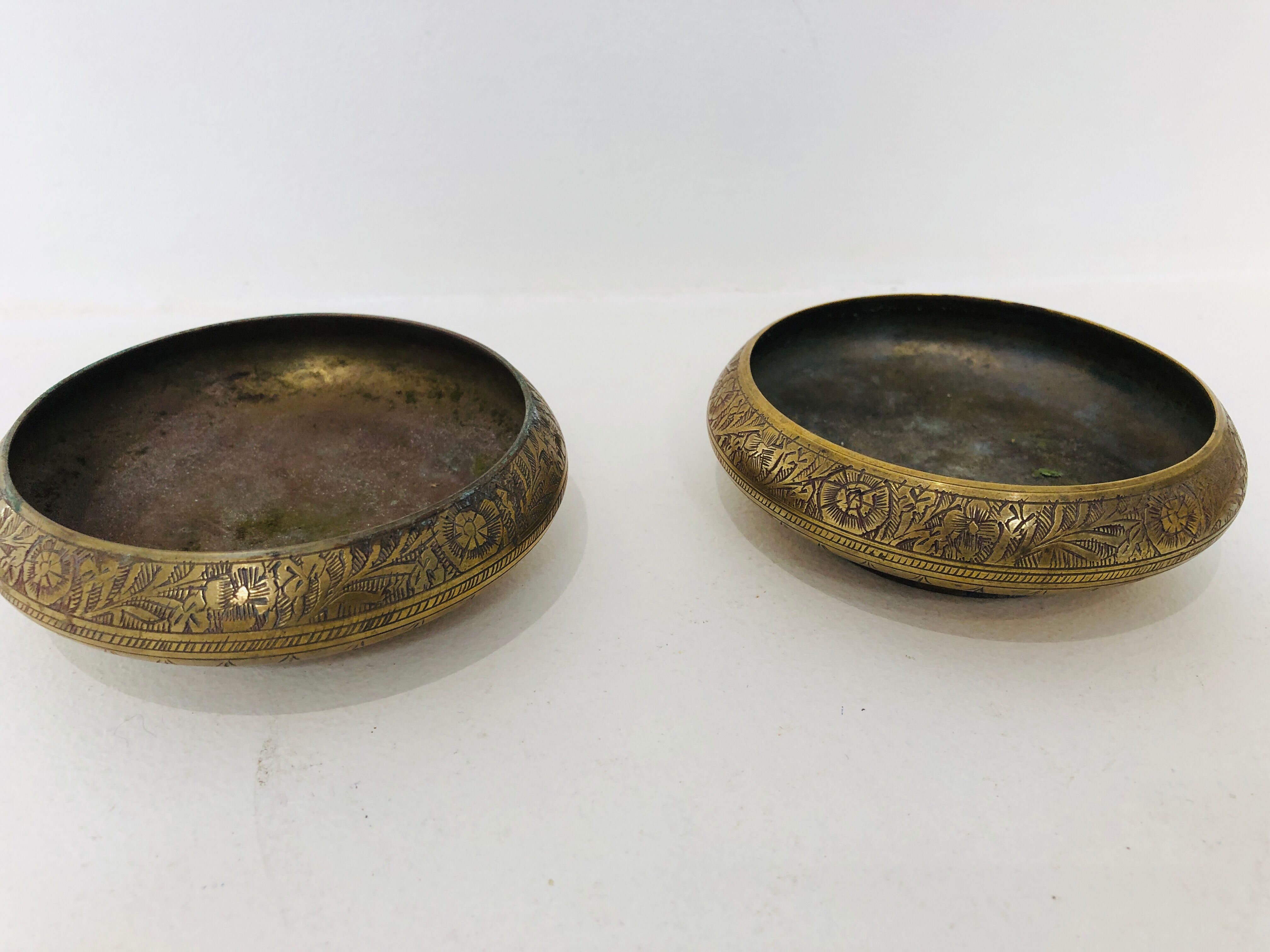 Pair of ostrich eggs on base, early 20th