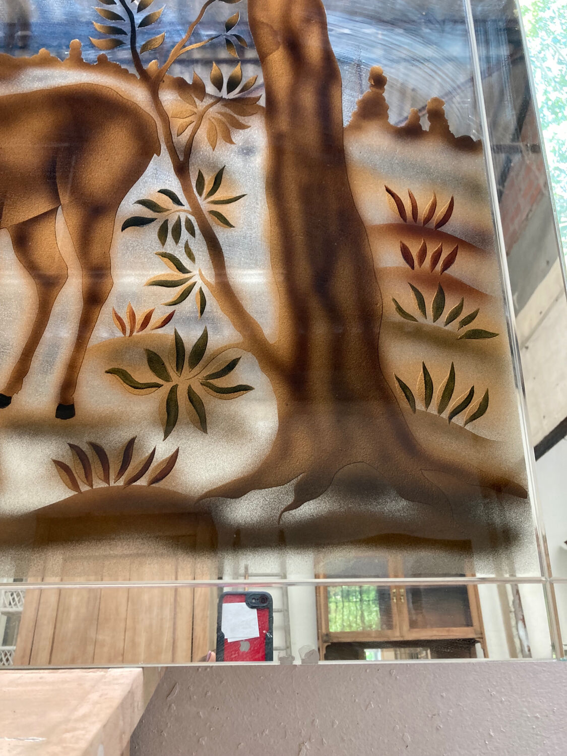 Doe-themed eglomized mirror