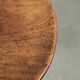 Round antique side/wine table from the late 18th century with a subtle foot