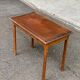 Vintage rectangular side table in solid oak from the 1920s.
