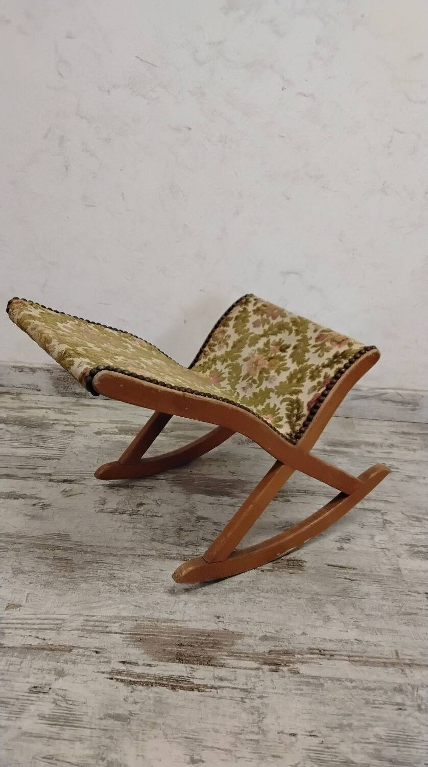 Antique rocking footrest