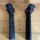 Pair of cast iron andirons from the 19th century, busts of women
