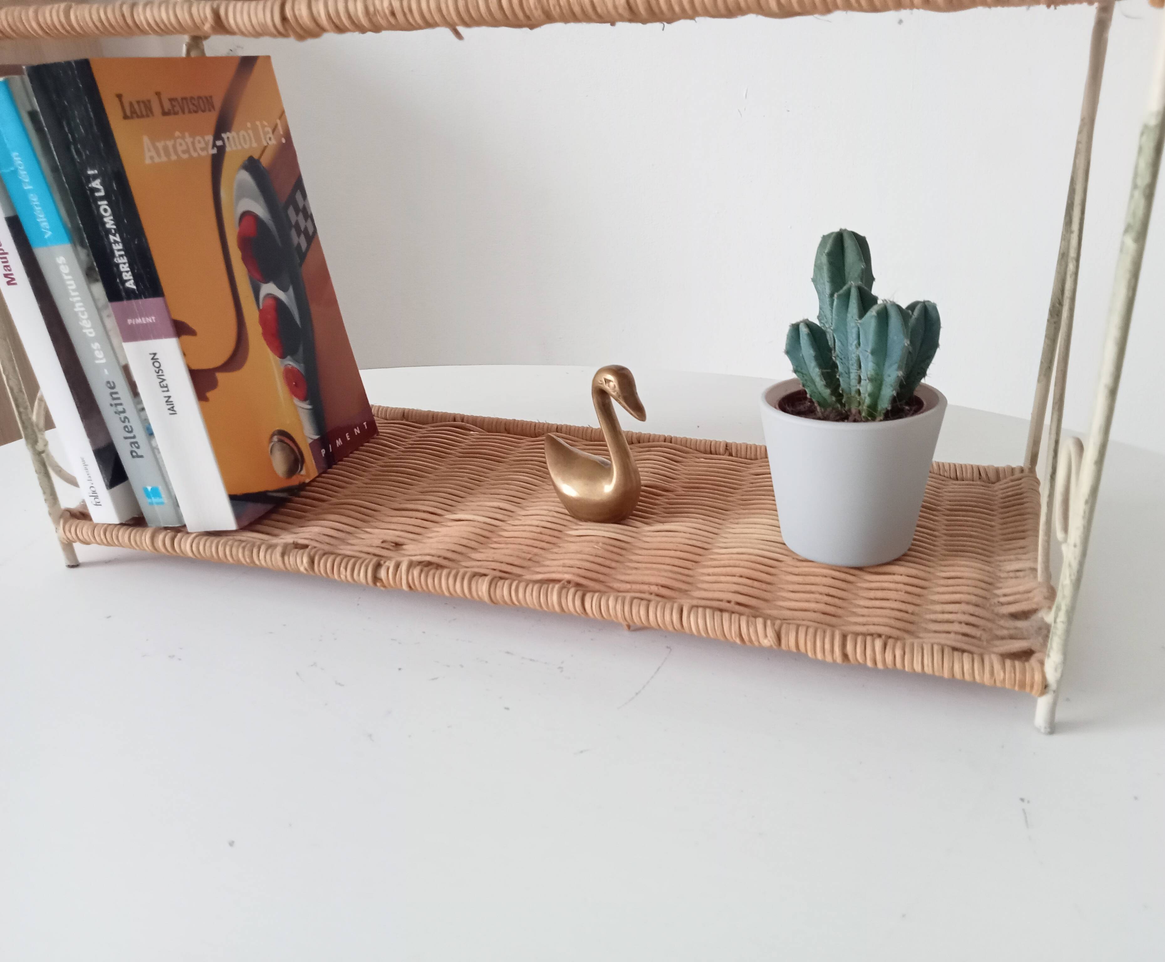Vintage wall shelf or freestanding wicker in bohemian style.