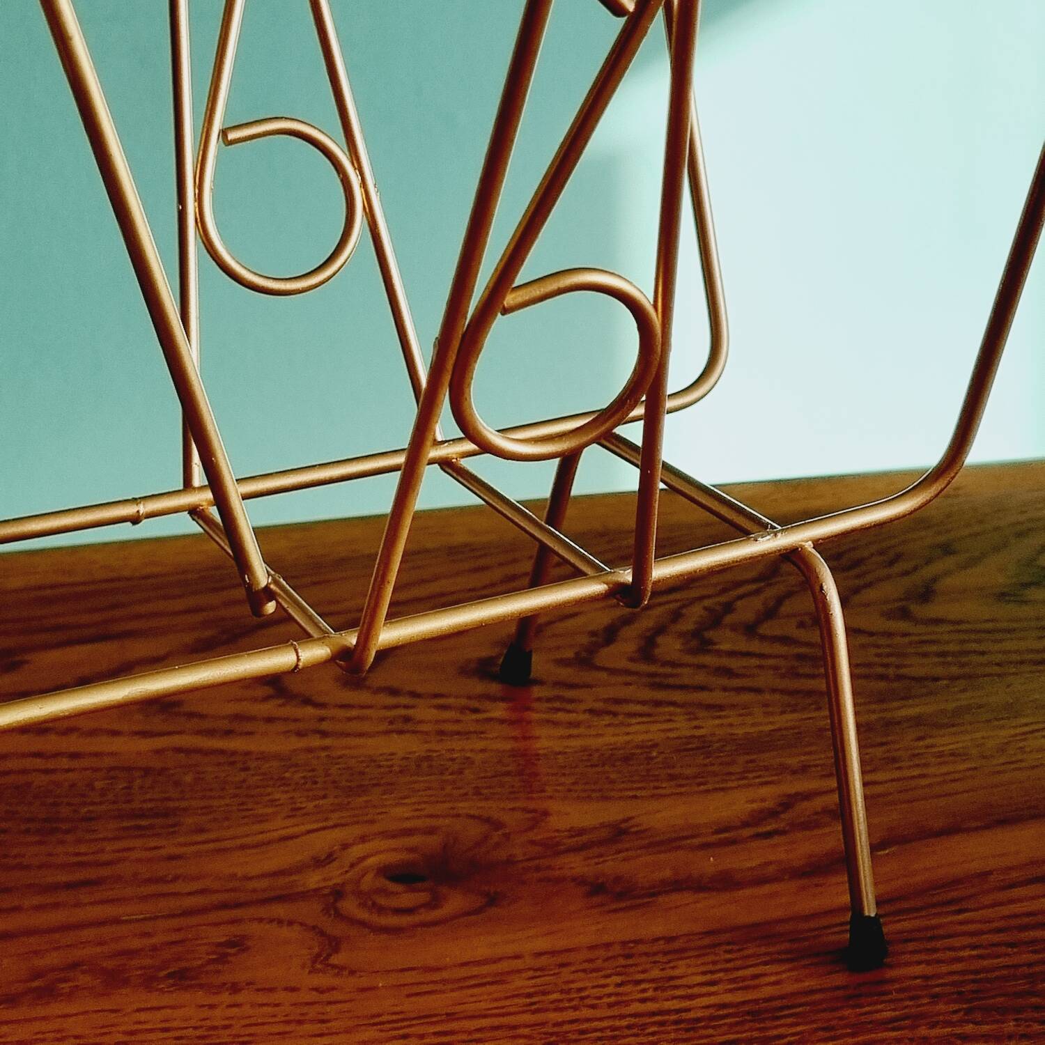 Golden metal magazine holder