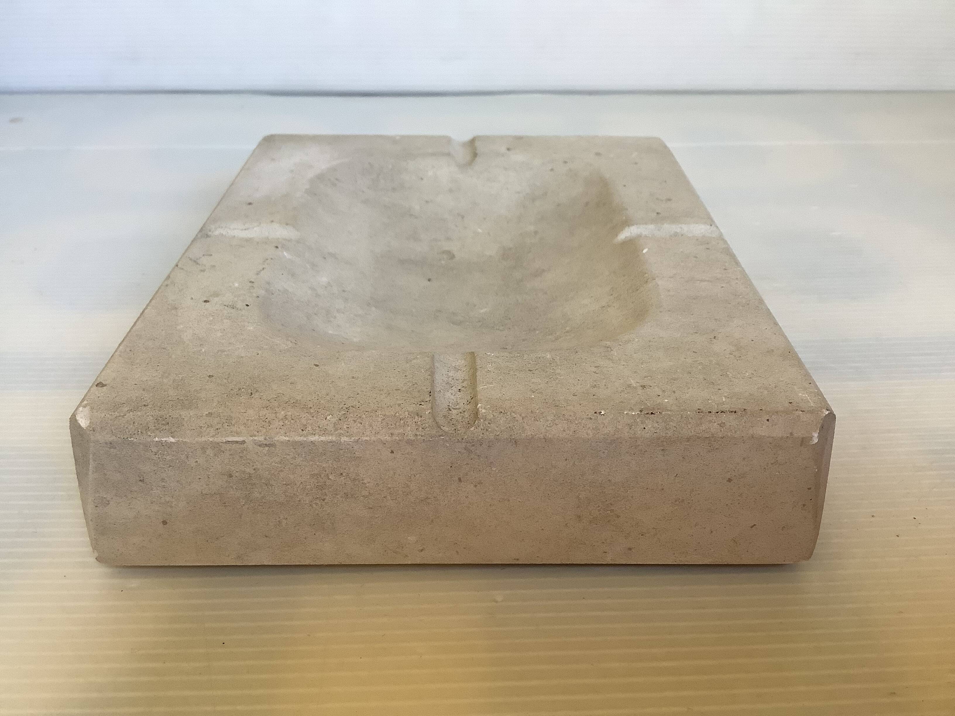 Stone ashtray pocket emptier