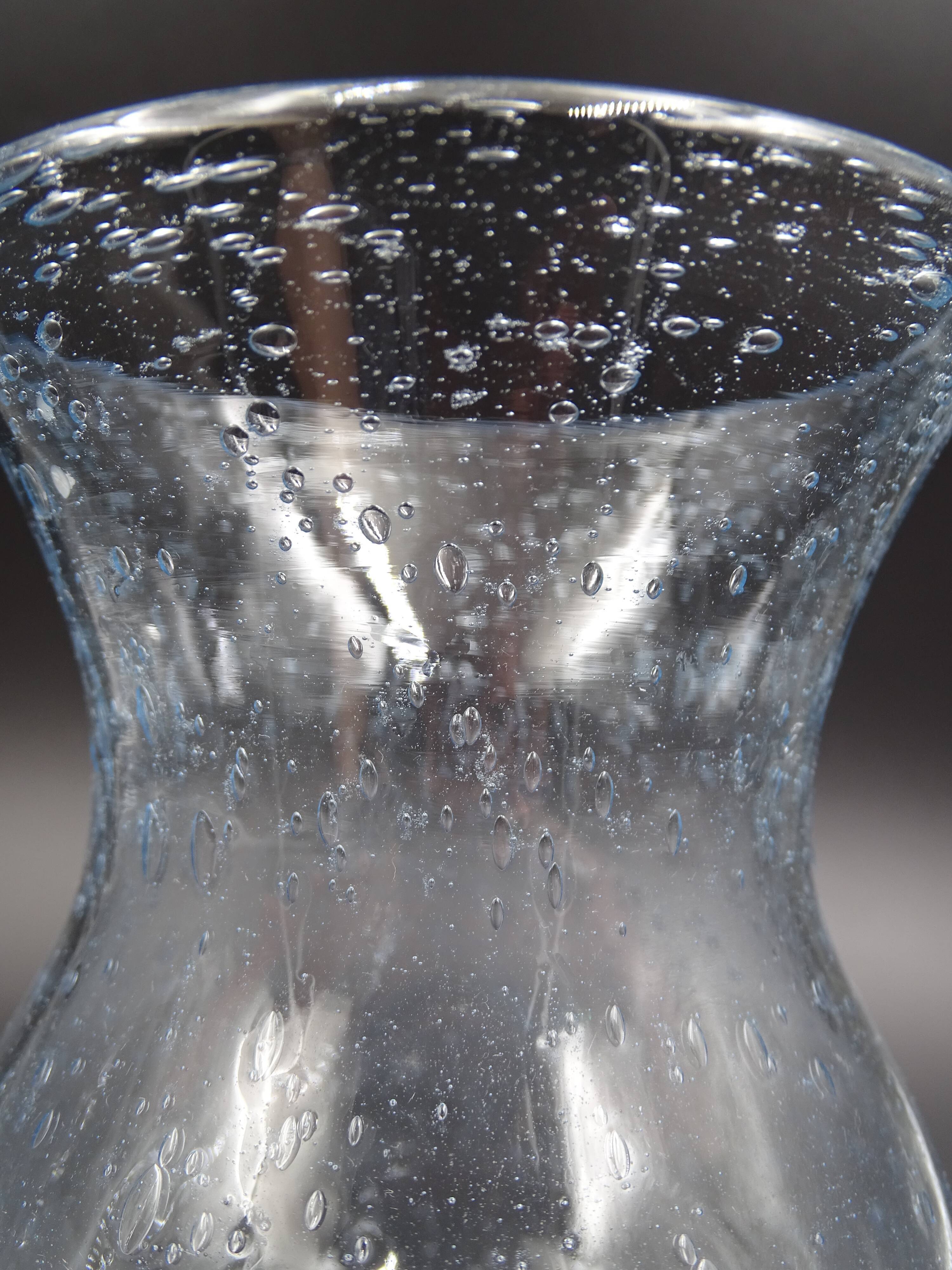 Candlestick or photophore in sky blue bulled glass, signed Biot