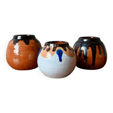 Set of three ethnic glazed terracotta ball vases from the 1970s.
