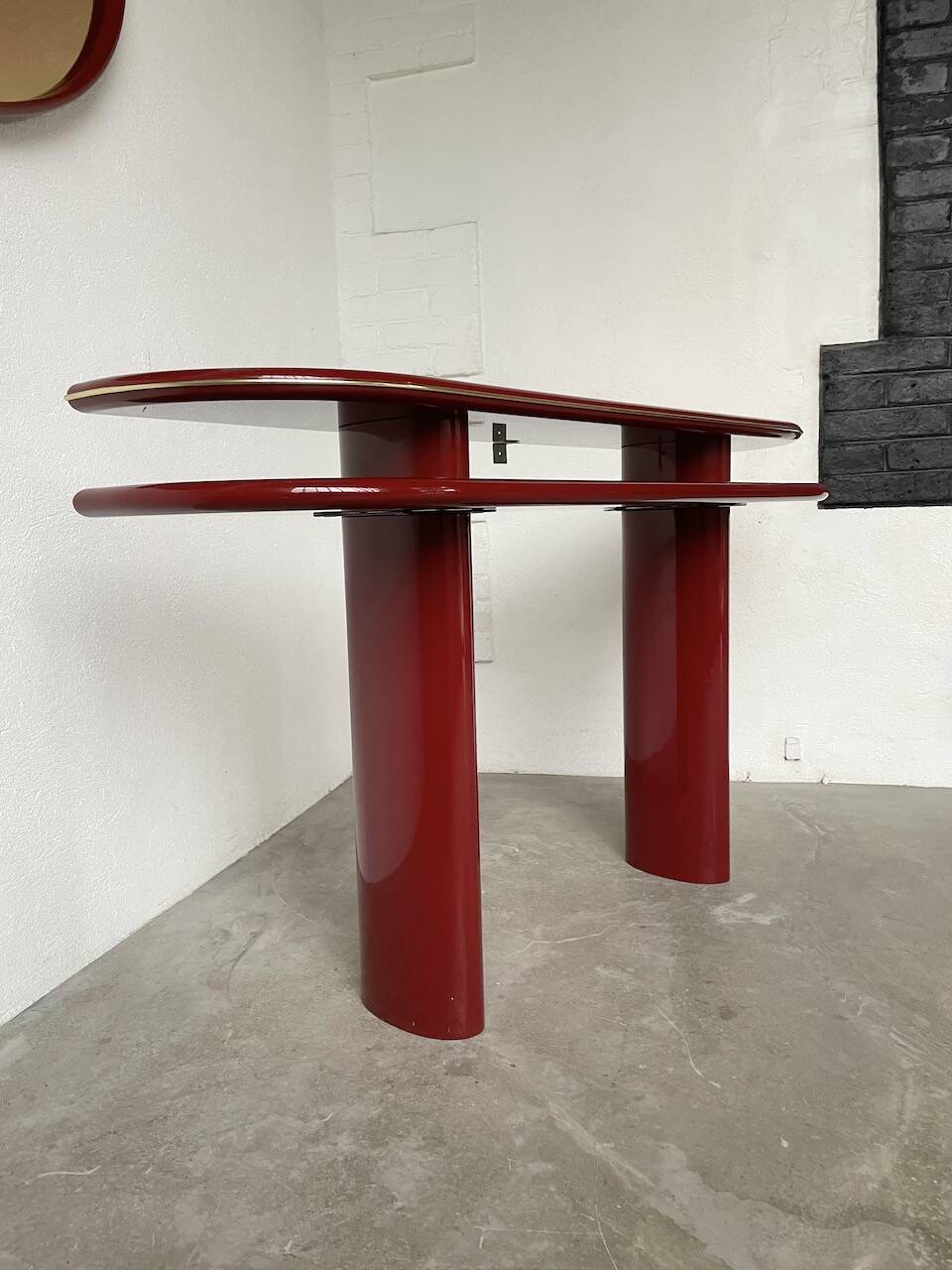 Red lacquered console and its mirror from the 80s
