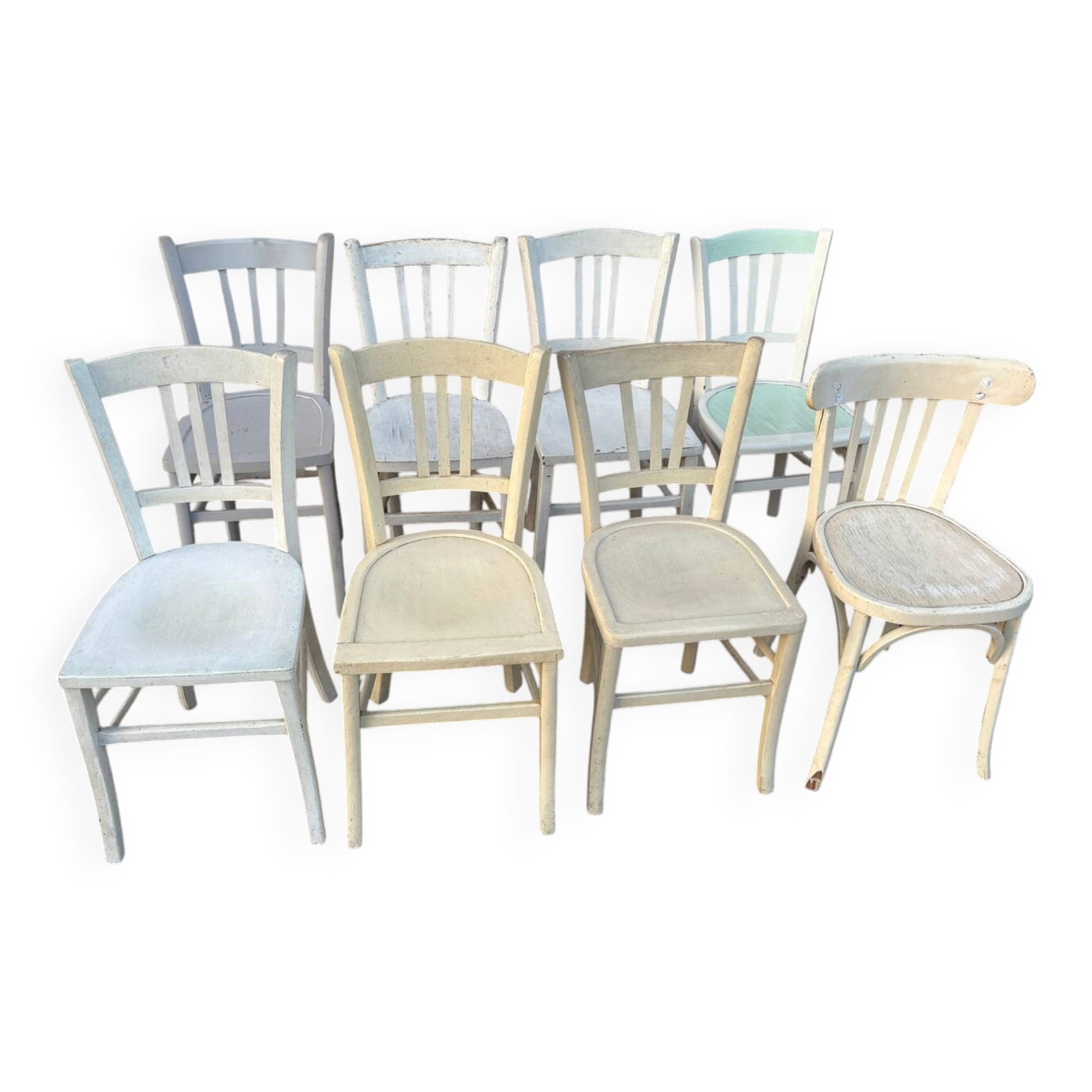 Set of 8 mismatched white bistro chairs