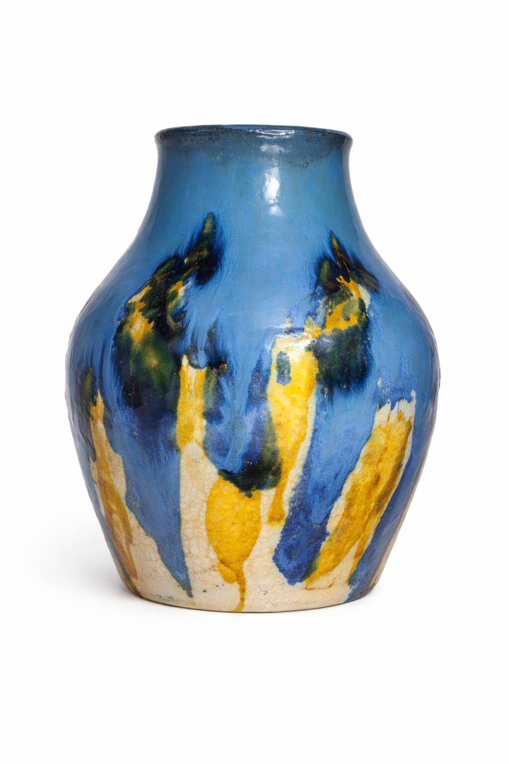 Baluster vase in Belgian ceramic with flowing blue and yellow glazes.