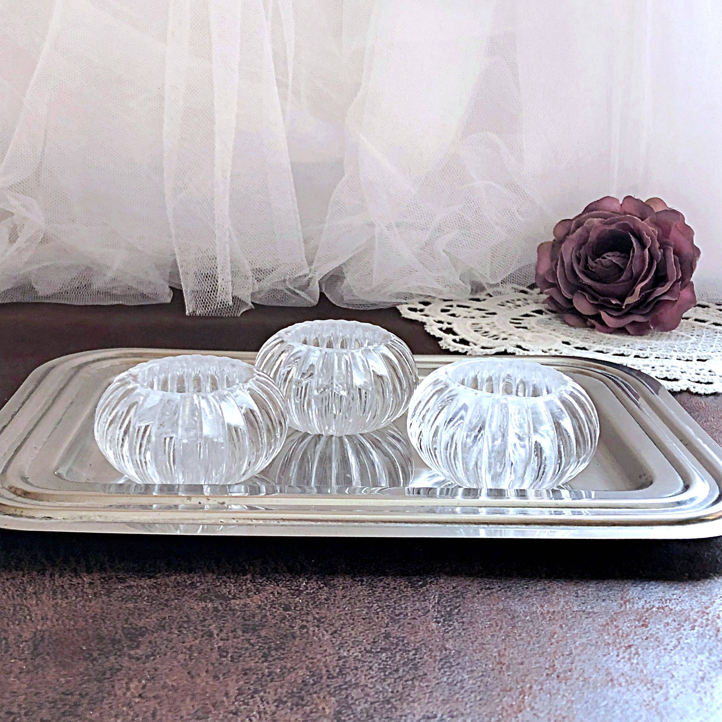 Trio of salt shakers, pepper shakers, molded glass salt shakers