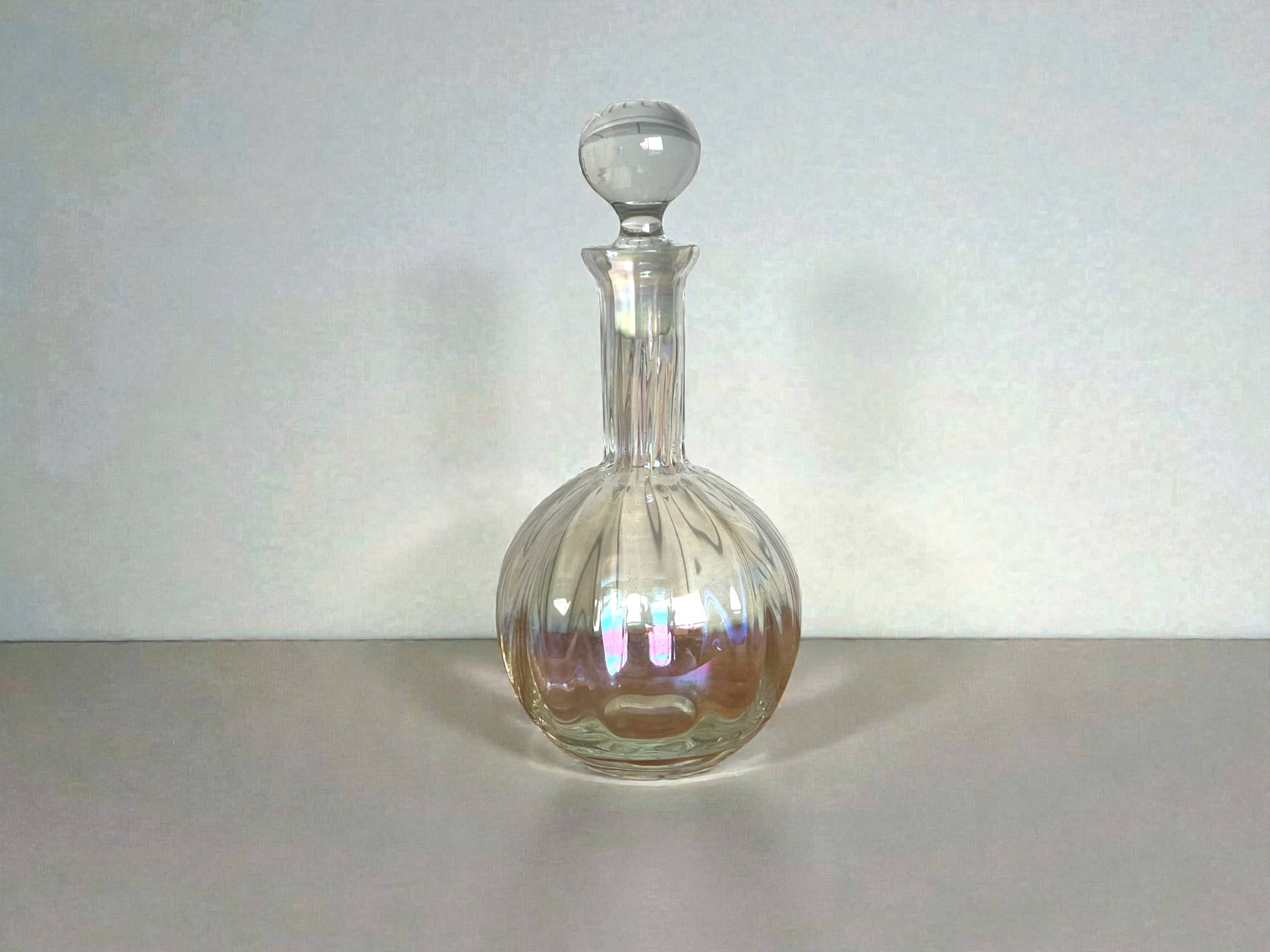 Round iridescent glass carafe, 20th century