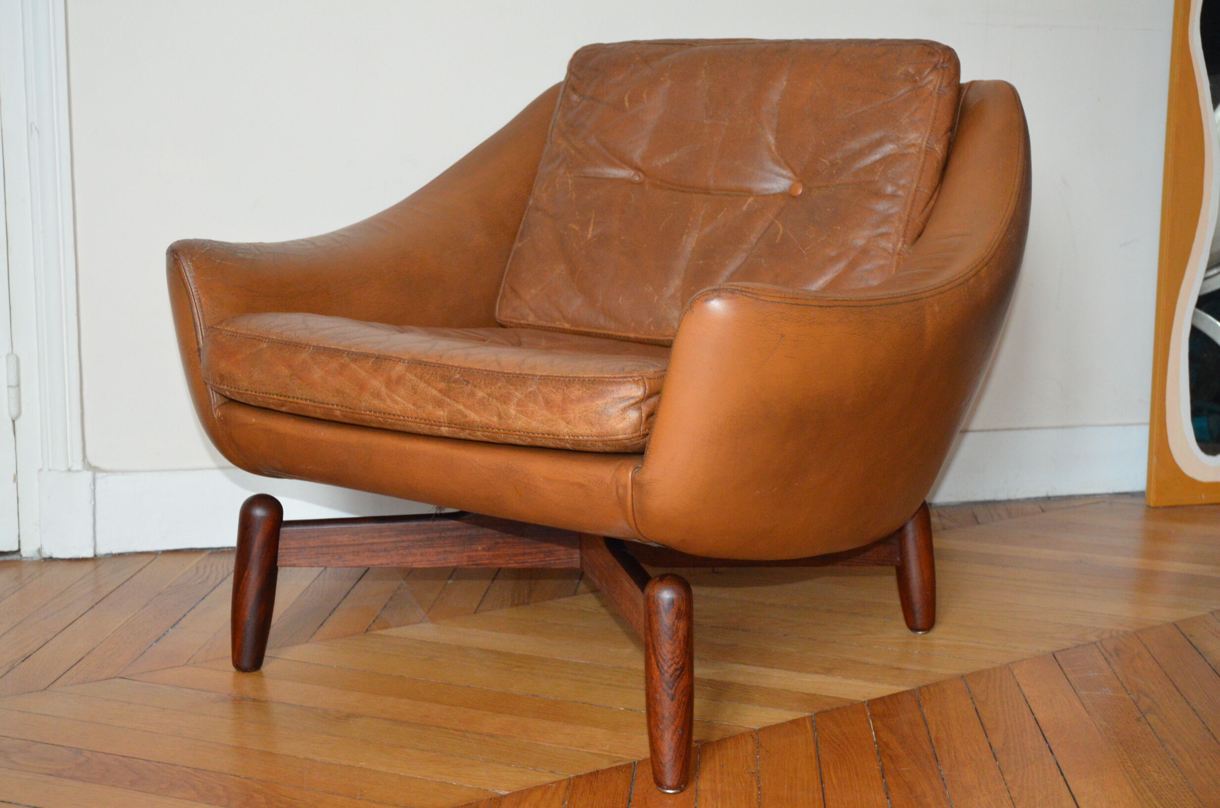 Scandinavian armchair in camel patinated leather