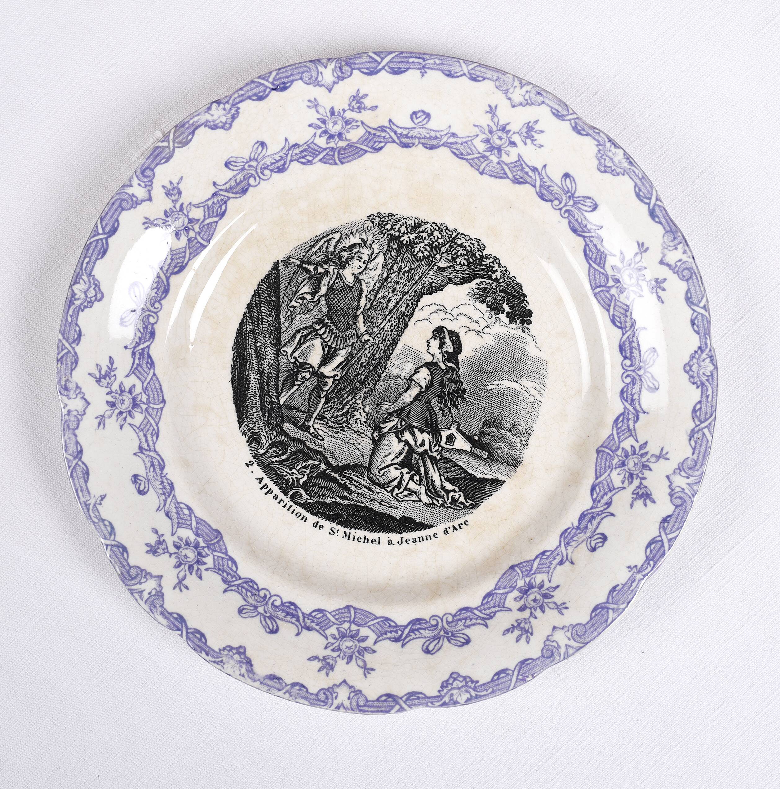 Collection of talking plates with Joan of Arc theme, in earthenware from the Choisy le Roi factory