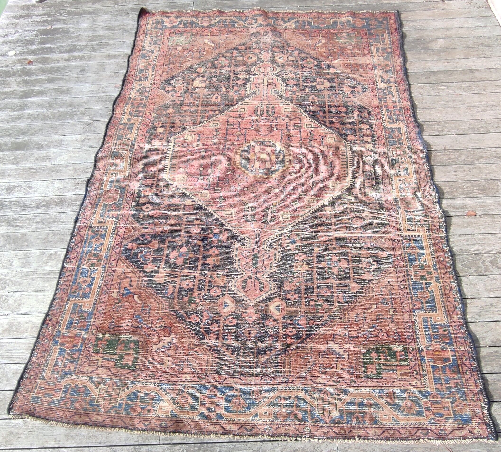 Old Persian carpet 1.62 m wide and 2.33 meters long