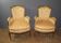 Pair of Louis XVI Bergères in walnut, late 18th century.