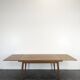 Modernist teak table with 2 extensions.
