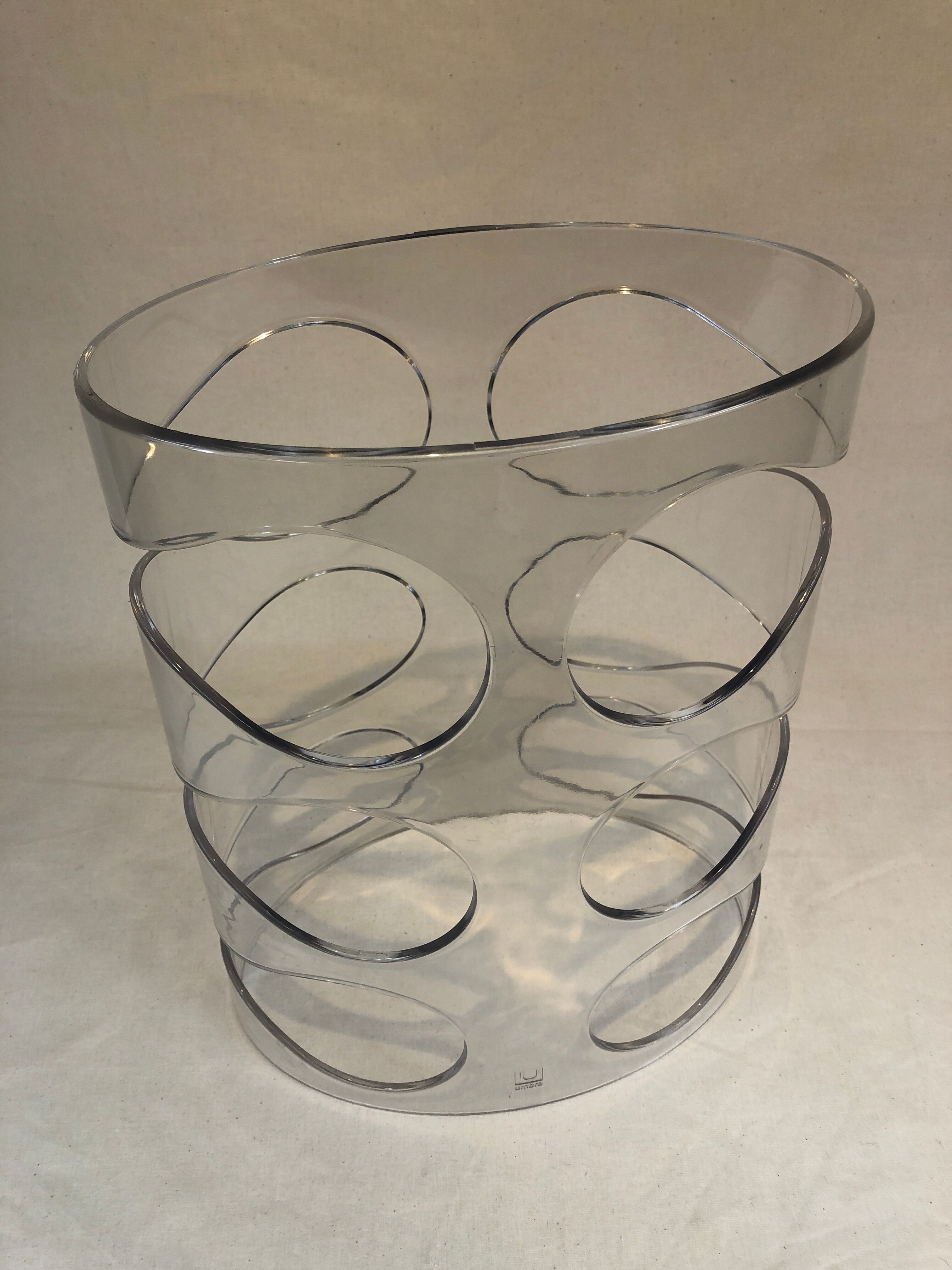 Transparent plexiglass bottle holder Umbra design Ran Lerner