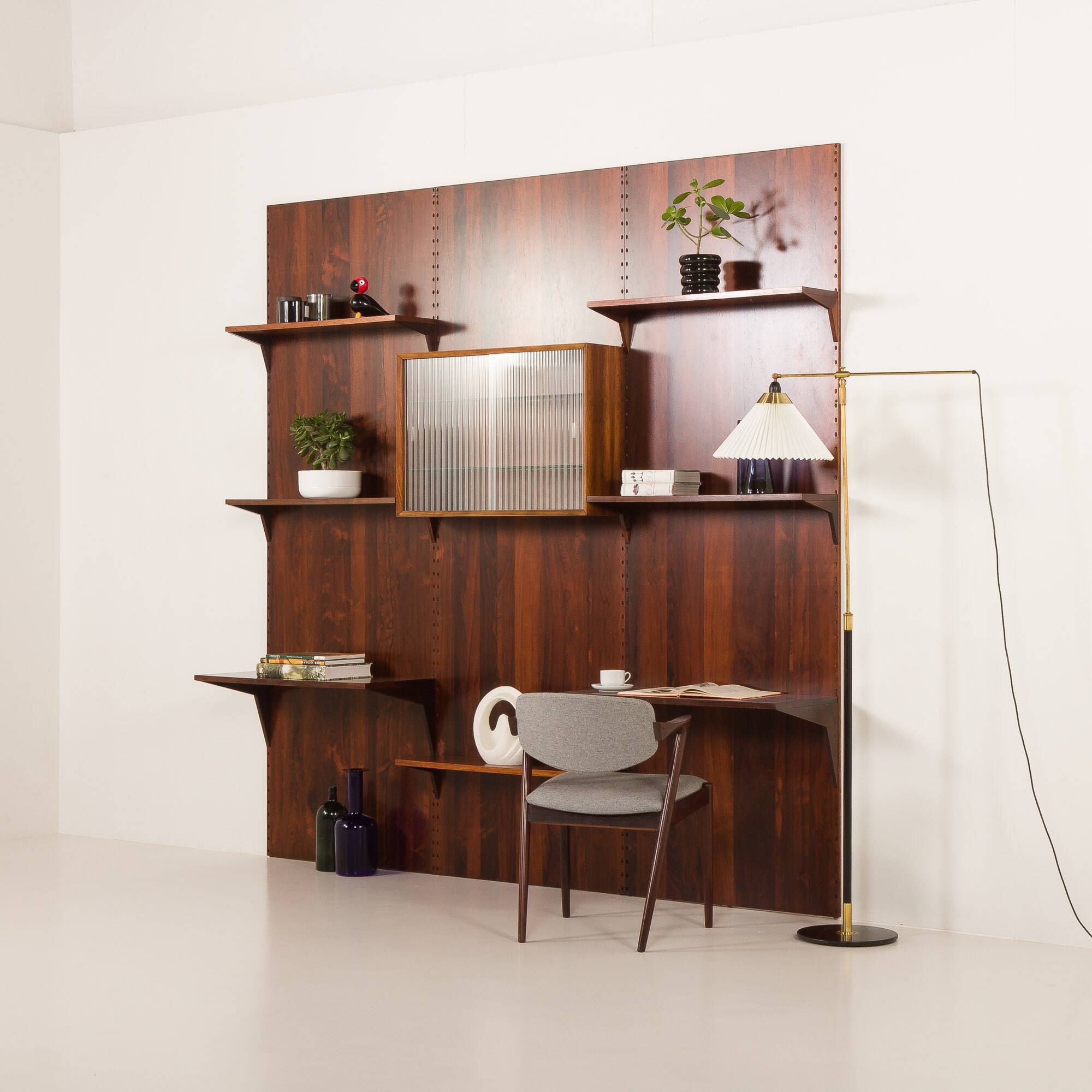 Poul Cadovius rosewood wall unit on panels for Cado, Denmark 1960s