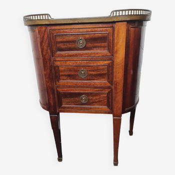 curved mahogany chest of drawers with marble top