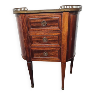 curved mahogany chest of drawers with marble top