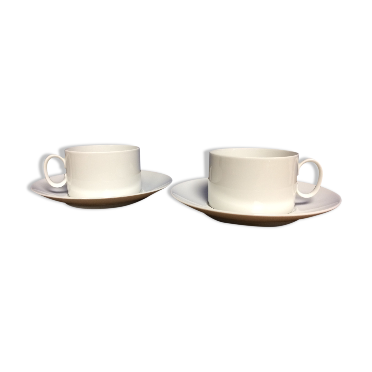Pair of white porcelain cups and saucers