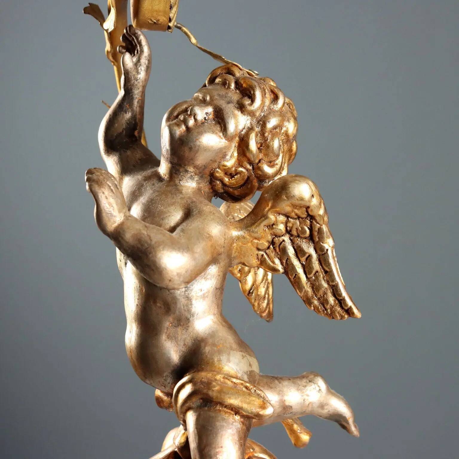 Pair of antique candelabra in carved and gilded wood, Italy, 20th century