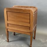 EAGLE in Paris. Wooden archive cabinet opening with two drawers and a curtain.