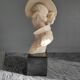 Elegant woman bust with alabaster shawl and black base of the 1950s