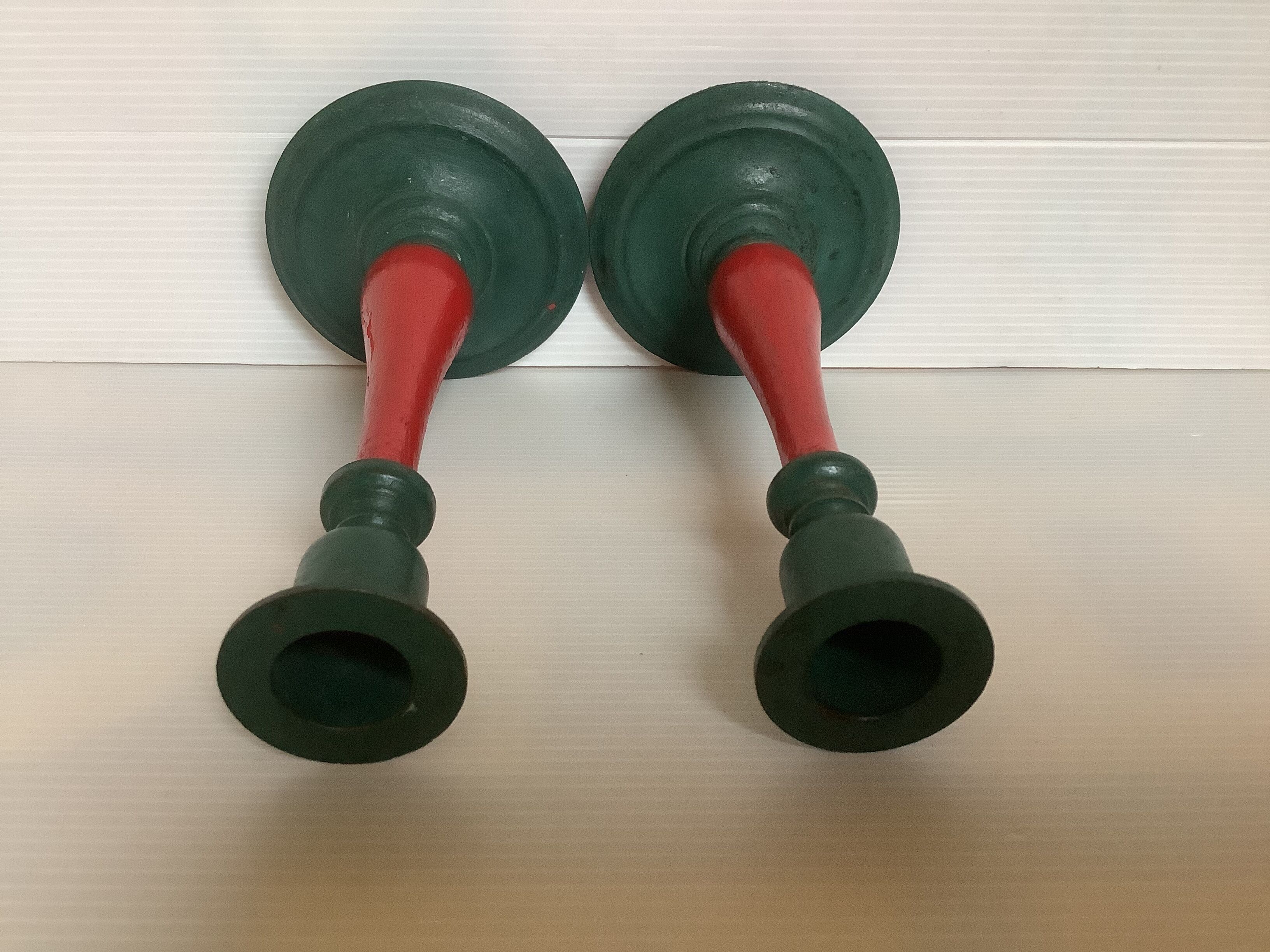 Pair of cast iron and wood candle holders