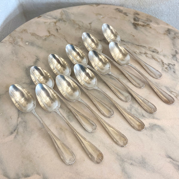 Series of 11 large old spoons, silver metal