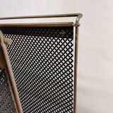 Vintage gold magazine rack from the 1960s.