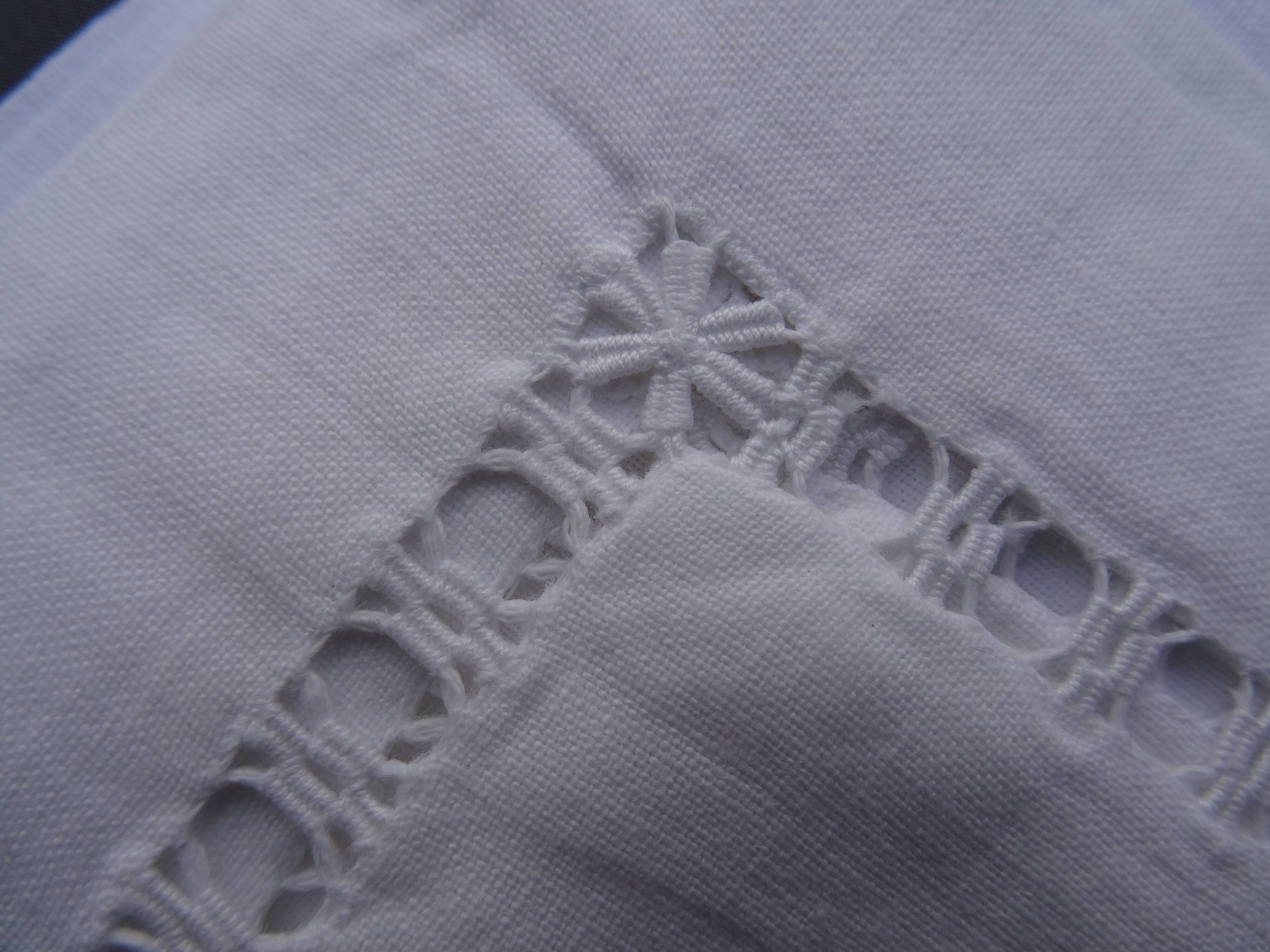 A pair of pillowcases monogrammed CD