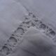 A pair of pillowcases monogrammed CD