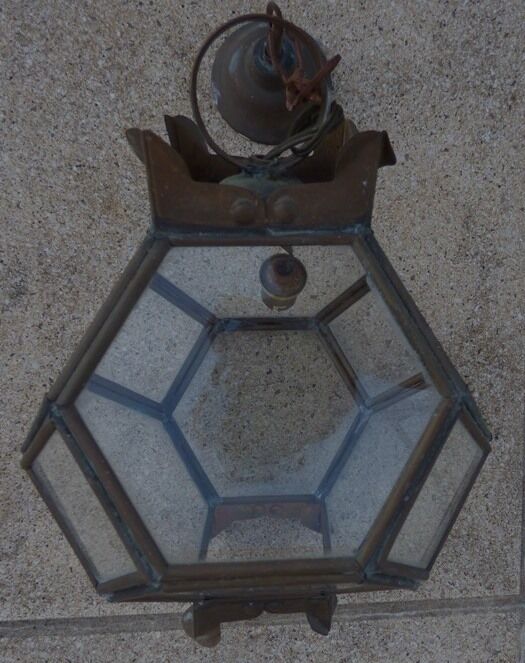 Old lantern in brass and glass with 8 facets or 24 stained glass windows