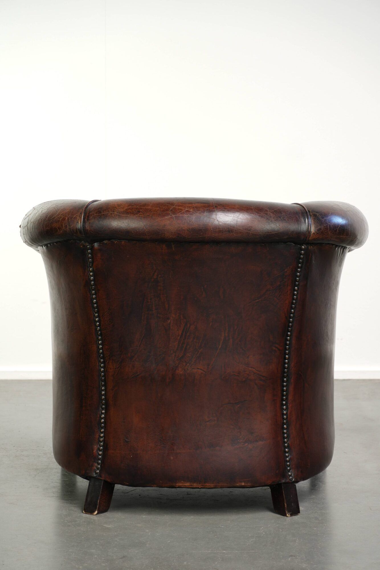 Vintage sheepskin club armchair with beautiful colours and a subtle size