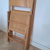 2 folding chairs canned