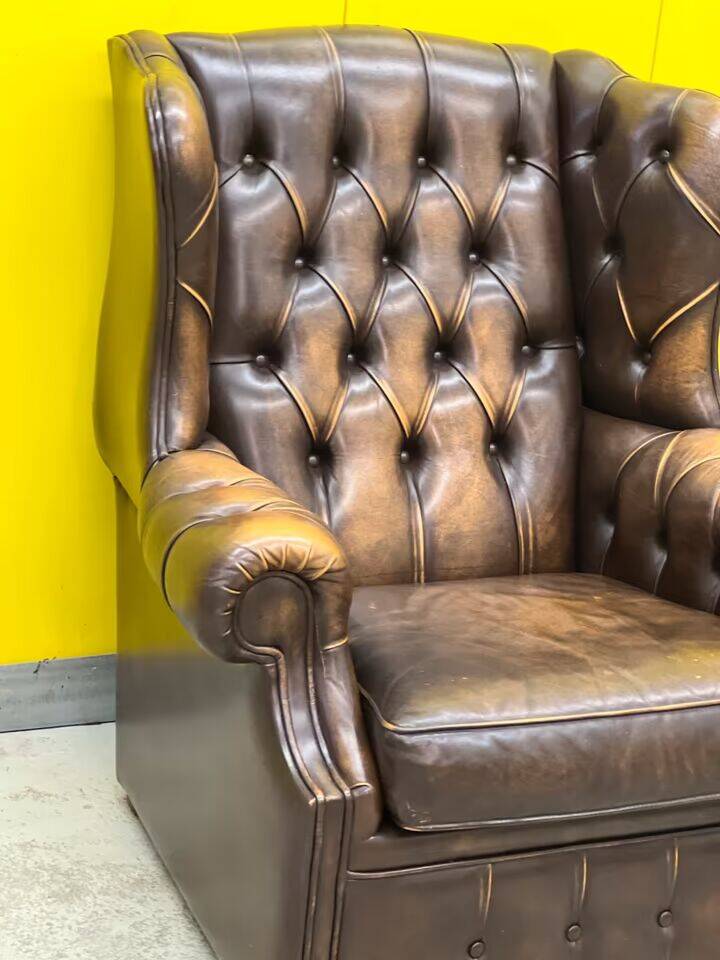 Brown leather chesterfield wing chair with Ottoman