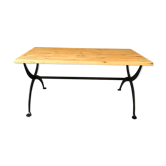 Raw wood table, hammered metal footing