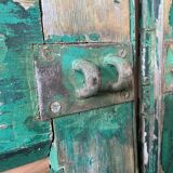 Old green shutter blinds