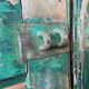Old green shutter blinds